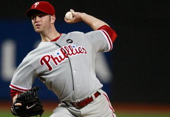 NEW YORK - AUGUST 22:  J.A. Happ #43 of the Philadelphia Phillies pitches against the New York Mets during the game on August 22, 2009 at Citi Field in the Flushing neighborhood of the Queens borough of New York City.  (Photo by Jared Wickerham/Getty Images)