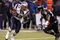 BALTIMORE - DECEMBER 3:  Kevin Faulk #33 of the New England Patriots rushes the ball against the Baltimore Ravens at M&T Bank Stadium December 3, 2007 in Baltimore, Maryland.  (Photo by Greg Fiume/Getty Images)