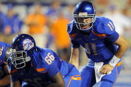 BOISE, ID - SEPTEMBER 3: Quarterback Kellen Moore #6 of the Boise State Broncos barks out signals as center Thomas Byrd #66 of the Boise State Broncos waits to snap the ball in the third quarter of the game against the Oregon Ducks at Bronco Stadium on September 3, 2009 in Boise, Idaho. Boise State won the game 19-8. (Photo by Steve Dykes/Getty Images)
