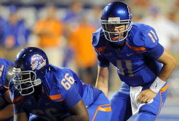 BOISE, ID - SEPTEMBER 3: Quarterback Kellen Moore #6 of the Boise State Broncos barks out signals as center Thomas Byrd #66 of the Boise State Broncos waits to snap the ball in the third quarter of the game against the Oregon Ducks at Bronco Stadium on September 3, 2009 in Boise, Idaho. Boise State won the game 19-8. (Photo by Steve Dykes/Getty Images)