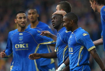 PORTSMOUTH, UNITED KINGDOM - SEPTEMBER 18:  Lassana Diarra of Portsmouth celebrates with his team-mates after scoring the first goal for Portsmouth during the UEFA Cup round one first leg match between Portsmouth and Guimaraes at Fratton Park on September 18, 2008 in Portsmouth, England.  (Photo by Paul Gilham/Getty Images)