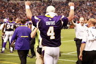 MINNEAPOLIS, MN - SEPTEMBER 27: Quarterback Brett Favre #4 of the Minnesota Vikings pumps his fists in celebration after defeating the San Francisco 49ers 27-24 at Hubert H. Humphrey Metrodome on September 27, 2009 in Minneapolis, Minnesota. Favre threw a 32-yard pass for a touchdown with two seconds left in the game for the win. (Photo by Genevieve Ross/Getty Images)