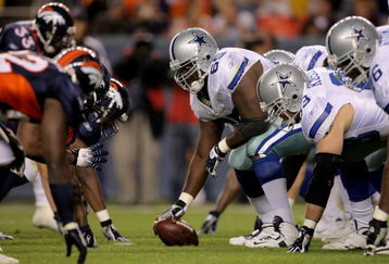 DENVER - AUGUST 16:  Center Andre Gurode #65 of the Dallas Cowboy prepares to snap the ball against the Denver Broncos during preseason NFL action at Invesco Field at Mile High on August 16, 2008 in Denver, Colorado. The Broncos defeated the Cowboys 23-13.  (Photo by Doug Pensinger/Getty Images)