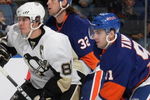 UNIONDALE, NY - OCTOBER 03: Playing in his first NHL game, John Tavares #91 of the New York Islanders skates against Sidney Crosby #87 of the Pittsburgh Penguins at the Nassau Coliseum on October 3, 2009 in Uniondale, New York. (Photo by Bruce Bennett/Getty Images)