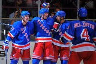 NEW YORK - OCTOBER 3: Brandon Dubinsky #17 of the New York Rangers is congratulated by Vinny Prospal #20, Michal Rozsival #33, and Michael Del Zotto #4, after scoring a second period goal against the Ottawa Senators at Madison Square Garden on October 3, 2009 in New York City. (Photo by Christopher Pasatieri/Getty Images)