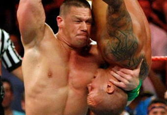 LAS VEGAS - AUGUST 24:  Wrestler John Cena picks up wrestler Randy Orton during the WWE Monday Night Raw show at the Thomas & Mack Center August 24, 2009 in Las Vegas, Nevada.  (Photo by Ethan Miller/Getty Images)