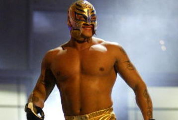 LAS VEGAS - DECEMBER 2:  (U.S. TABLOIDS OUT)   WWE wrestler Rey Mysterio walks on stage during the '1st Annual Video Game Awards' at the MGM Grand Garden Arena December 2, 2003 in Las Vegas, Nevada.  The show premieres on Spike T.V. Thursday, December 4 at 9:00PM ET/PT.  (Photo by Frank Micelotta/Getty Images)