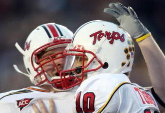 CHESTNUT HILL, MA - NOVEMBER 29:  Chris Turner #10 of the Maryland Terrapins celebrates his touchdown with teammate Cory Jackson #38 in the first quarter against the Boston College Eagles on November 29, 2008 at Alumni Stadium in Chestnut Hill, Massachusetts.  (Photo by Elsa/Getty Images)