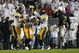 STATE COLLEGE, PA - SEPTEMBER 26:  A.J. Edds #49 of the Iowa Hawkeyes celebrates a fourth quarter interception with Pat Angerer #43 and Jeremiha Hunter #42 in front of Chaz Powell #2 of the Penn State Nittnay Lions  on September 26, 2009 at Beaver Stadium in State College, Pennsylvania. Iowa won the game 21-10.  (Photo by Gregory Shamus/Getty Images)