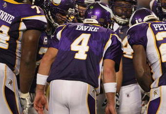 MINNEAPOLIS - SEPTEMBER 27: Brett Favre #4 of the Minnesota Vikings calls a play in the huddle against the San Francisco 49ers at the Hubert H. Humphrey Metrodome on September 27, 2009 in Minneapolis, Minnesota. The Vikings defeated the 49ers 27-24.  (Photo by Jonathan Daniel/Getty Images)