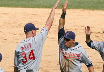 CHICAGO - AUGUST 09:  Pitcher Kerry Woods #34 of the Cleveland Indians celebrates with Asdrubal Cabrera #13 after winning the game against the Chicago White Sox on August 9, 2009 at U.S. Cellular Field in Chicago, Illinois. The Indians defeated the White Sox 8-4. (Photo by Jonathan Daniel/Getty Images) 