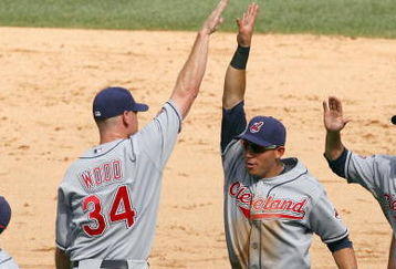 CHICAGO - AUGUST 09:  Pitcher Kerry Woods #34 of the Cleveland Indians celebrates with Asdrubal Cabrera #13 after winning the game against the Chicago White Sox on August 9, 2009 at U.S. Cellular Field in Chicago, Illinois. The Indians defeated the White Sox 8-4. (Photo by Jonathan Daniel/Getty Images) 