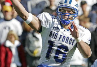 PROVO, UT - OCTOBER 29:  Quarterback Adam Fitch #16 of Air Force passes against Brigham Young University during the second quarter October 29, 2005 at LaVell Edwards Stadium in Provo, Utah. Fitch replaced Shaun Carney who cut his left hand and had to leave the game.  (Photo by George Frey/Getty Images)