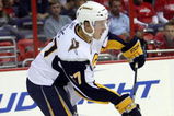 WASHINGTON - SEPTEMBER 21: Tyler Myers #57 of the Buffalo Sabres handles the puck against the Washington Capitals during an NHL preseason hockey game on September 21, 2009 at the Verizon Center in Washington, DC. The Sabres won 2-1. (Photo by Ned Dishman/Getty Images)