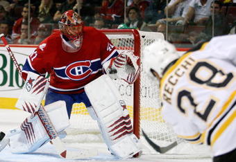 MONTREAL- SEPTEMBER 24:  Jaroslav Halak #41 of the Montreal Canadiens makes a glove save on a shot by Mark Recchi #28 of the Boston Bruins during their NHL Preseason game on September 24, 2009 at the Bell Centre in Montreal, Quebec, Canada.  The Bruins defeated the Canadiens 2-1 in a shootout.  (Photo by Richard Wolowicz/Getty Images)
