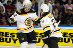 QUEBEC CITY- SEPTEMBER 20:  Chuck Kobasew #12 of the Boston Bruins celebrates his second period goal with Mark Recchi #28 during their NHL Preseason game against the Montreal Canadiens on September 20, 2009 at the Colisee Pepsi in Quebec City, Quebec, Canada.  (Photo by Richard Wolowicz/Getty Images)