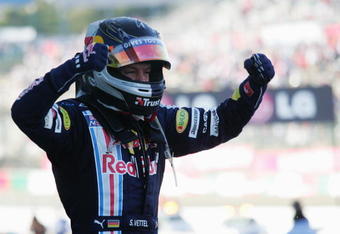 SUZUKA, JAPAN - OCTOBER 04:  Sebastian Vettel of Germany and Red Bull Racing celebrates in parc ferme as he wins the Japanese Formula One Grand Prix at Suzuka Circuit on October 4, 2009 in Suzuka, Japan.  (Photo by Getty Images)