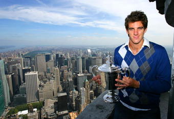 NEW YORK - SEPTEMBER 15: Juan Martin Del Potro the 2009 US Open Tennis Champion poses with the US Open trophy on a viewing deck at the Empire State Building on September 15, 2009 in New York City.  (Photo by Chris Trotman/Getty Images for ATP Tour)