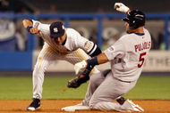 NEW YORK - JULY 15:  American League All-Star  Derek Jeter #2 of the New York Yankees tags out National League All-Star Albert Pujols #5 of the St. Louis Cardinals during the 79th MLB All-Star Game at Yankee Stadium on July 15, 2008 in the Bronx borough of New York City.  (Photo by Jim McIsaac/Getty Images)