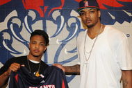 ATLANTA - MAY 24: Rapper T.I. and Atlanta Hawk, Josh Smith backstage at the Philips Arena on May 24, 2009 in Atlanta, Georgia. (Photo by Rick Diamond/Getty Images)