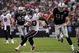 HOUSTON - OCTOBER 04: Running back Steve Slaton #20 of the Houston Texans runs for a touchdown past Trevor Scott #91 of the Oakland Raiders at Reliant Stadium on October 4, 2009 in Houston, Texas. (Photo by Ronald Martinez/Getty Images)