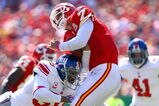 KANSAS CITY, MO - OCTOBER 04:  Quarterback Matt Cassel #7 of the Kansas City Chiefs is hit by Antonio Pierce #58 of the New York Giants during the game on October 4, 2009 at Arrowhead Stadium in Kansas City, Missouri.  (Photo by Jamie Squire/Getty Images)