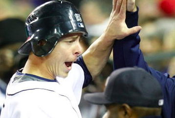 DETROIT - SEPTEMBER 30:  Brandon Inge #15 of the Detroit Tigers is greeted at the dugout after scoring a run in the second inning off a Ramon Santiago #39 single against the Minnesota Twins during the game on September 30, 2009 at Comerica Park in Detroit, Michigan. (Photo by Gregory Shamus/Getty Images)