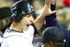 DETROIT - SEPTEMBER 30:  Brandon Inge #15 of the Detroit Tigers is greeted at the dugout after scoring a run in the second inning off a Ramon Santiago #39 single against the Minnesota Twins during the game on September 30, 2009 at Comerica Park in Detroit, Michigan. (Photo by Gregory Shamus/Getty Images)