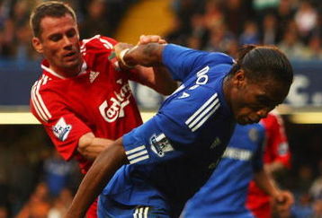 LONDON - OCTOBER 04:  Jamie Carragher of Liverpool (L) tussles with Didier Drogba of Chelsea during the Barclays Premier League match between Chelsea and Liverpool at Stamford Bridge on October 4, 2009 in London, England.  (Photo by Ian Walton/Getty Images)