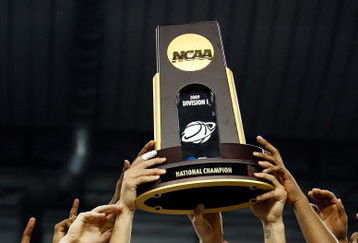 DETROIT - APRIL 06:  Danny Green #14 of the North Carolina Tar Heels celebrates with the championship trophy after defeating the Michigan State Spartans 89-72 during the 2009 NCAA Division I Men's Basketball National Championship game at Ford Field on April 6, 2009 in Detroit, Michigan.  (Photo by Streeter Lecka/Getty Images)