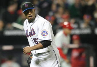 NEW YORK - MAY 06:  Johan Santana  #57 of the New York Mets pitches against the Philadelphia Phillies at Citi Field on May 6, 2009 in the Flushing neighborhood of the Queens borough of New York City.  (Photo by Nick Laham/Getty Images)