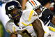 AUBURN, AL - SEPTEMBER 19: Noel Devine #7 of the West Virginia Mountaineers scores a touchdown against Neiko Thorpe #15 of the Auburn Tigers at Jordan-Hare Stadium on September 19, 2009 in Auburn, Alabama. (Photo by Kevin C. Cox/Getty Images)