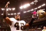 NEW ORLEANS - OCTOBER 04:  Darren Sharper #42 of the New Orleans Saints celebrates after defeating the New York Jets 24-10 at the Louisana Superdome on October 4, 2009 in New Orleans, Louisiana.  (Photo by Chris Graythen/Getty Images)