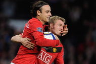 MANCHESTER, ENGLAND - OCTOBER 03:  Dimitar Berbatov of Manchester United celebrates scoring his team's first goal with Darren Fletcher (R) during the Barclays Premier League match between Manchester United and Sunderland at Old Trafford on October 3, 2009 in Manchester, England.  (Photo by Michael Regan/Getty Images)