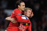 MANCHESTER, ENGLAND - OCTOBER 03:  Dimitar Berbatov of Manchester United celebrates scoring his team's first goal with Darren Fletcher (R) during the Barclays Premier League match between Manchester United and Sunderland at Old Trafford on October 3, 2009 in Manchester, England.  (Photo by Michael Regan/Getty Images)