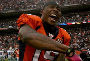 DENVER - OCTOBER 04:  Brandon Marshall #15 of the Denver Broncos celebrates after the final play against the Dallas Cowboys during NFL action at Invesco Field at Mile High on October 4, 2009 in Denver, Colorado. Marshall caught a game winning 51 yard reception late in the fourth quarter as the Broncos defeated the Cowboys 17-10.  (Photo by Doug Pensinger/Getty Images)