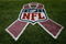 DENVER - OCTOBER 04:  The NFL logo is adorned with a pink ribbon on the sidelines as part of a program to raise awareness for breast cancer as the Dallas Cowboys face the Denver Broncos during NFL action at Invesco Field at Mile High on October 4, 2009 in Denver, Colorado. Throughout October, NFL games will feature players, coaches and referees wearing pink game apparel for the 'A Crucial Catch' program to raise awareness for breast cancer screening.  (Photo by Doug Pensinger/Getty Images)