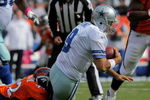 DENVER - OCTOBER 04:  Elivs Dumervil #92 of the Denver Broncos sacks quarterback Tony Romo #9 of the Dallas Cowboys during NFL action at Invesco Field at Mile High on October 4, 2009 in Denver, Colorado. The Broncos defeated the Cowboys 17-10.  (Photo by Doug Pensinger/Getty Images)