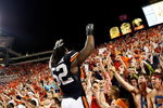 AUBURN, AL - SEPTEMBER 19:  Antonio Coleman #52 of the Auburn Tigers cheers with the fans against the West Virginia Mountaineers at Jordan-Hare Stadium on September 19, 2009 in Auburn, Alabama.  (Photo by Kevin C. Cox/Getty Images)