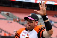 CLEVELAND - OCTOBER 04:  Carson Palmer #9 of the Cincinnati Bengals waves to his teams fans after defeating the Cleveland Browns at Cleveland Browns Stadium on October 4, 2009 in Cleveland, Ohio. The Bengals defeated the Browns 23-20 in overtime.  (Photo by Jim McIsaac/Getty Images)