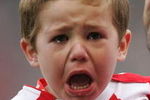 STOKE, UNITED KINGDOM - NOVEMBER 29:  Stoke City Mascot cries as he is carried onto the pitch by Danny Higginbotham of Stoke during the Barclays Premier League match between Stoke City and Hull City at The Britannia Stadium on November 29, 2008 in Stoke, England.  (Photo by Christopher Lee/Getty Images)