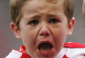 STOKE, UNITED KINGDOM - NOVEMBER 29:  Stoke City Mascot cries as he is carried onto the pitch by Danny Higginbotham of Stoke during the Barclays Premier League match between Stoke City and Hull City at The Britannia Stadium on November 29, 2008 in Stoke, England.  (Photo by Christopher Lee/Getty Images)