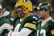 GREEN BAY, WI - NOVEMBER 6: Quarterbacks Brett Favre #4 and Aaron Rodgers #12 of the Green Bay Packers watch the final minutes of a game against the Pittsburgh Steelers from the sideline November 6, 2005 at Lambeau Field in Green Bay, Wisconsin. The Steelers defeated the Packers, 20-10. (Photo by Jonathan Daniel/Getty Images)