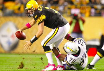 PITTSBURGH - OCTOBER 4:  Alfonso Boone #70 of the San Diego Chargers sacks quarterback Ben Roethlisberger #7 of the Pittsburgh Steelers in the first half at Heinz Field on October 4, 2009 in Pittsburgh, Pennsylvania. (Photo by Gregory Shamus/Getty Images)