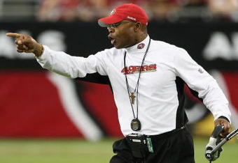 GLENDALE, AZ - SEPTEMBER 13:  Head coach  Mike Singletary of the San Francisco 49ers calls to players during the NFL game against the Arizona Cardinals at the Universtity of Phoenix Stadium on September 13, 2009 in Glendale, Arizona.  The 49ers defeated the Cardinals 20-16.  (Photo by Christian Petersen/Getty Images)