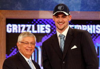 NEW YORK - JUNE 26:  NBA Commissioner David Stern shakes hands with number five draft pick for the Memphis Grizzlies, Kevin Love during the 2008 NBA Draft at the Wamu Theatre at Madison Square Garden June 26, 2008 in New York City. NOTE TO USER: User expressly acknowledges and agrees that, by downloading and or using this photograph, User is consenting to the terms and conditions of the Getty Images License Agreement.  (Photo by Nick Laham/Getty Images)