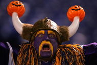 MINNEAPOLIS, MN - OCTOBER 30:   A Vikings fan supplements his Viking costume with a pair of Jack-o-lanterns for Halloween before the game between the New England Patriots and the Minnesota Vikings on October 30, 2006 at the Metrodome in Minneapolis, Minnesota. (Photo by Stephen Dunn/Getty Images)