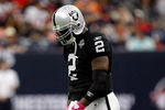 HOUSTON - OCTOBER 04:  Quarterback JaMarcus Russell #2 of the Oakland Raiders walks off the field during play against the Houston Texans at Reliant Stadium on October 4, 2009 in Houston, Texas.  (Photo by Ronald Martinez/Getty Images)