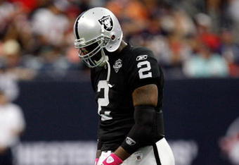 HOUSTON - OCTOBER 04:  Quarterback JaMarcus Russell #2 of the Oakland Raiders walks off the field during play against the Houston Texans at Reliant Stadium on October 4, 2009 in Houston, Texas.  (Photo by Ronald Martinez/Getty Images)