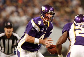 MINNEAPOLIS, MN - SEPTEMBER 27:  Quarterback Brett Favre #4 (L) of the Minnesota Vikings hands off the football to running back Adrian Peterson #28 during the game against the San Francisco 49ers at Hubert H. Humphrey Metrodome on September 27, 2009 in Minneapolis, Minnesota. The Vikings defeated the 49ers 27-24. (Photo by Genevieve Ross/Getty Images) 